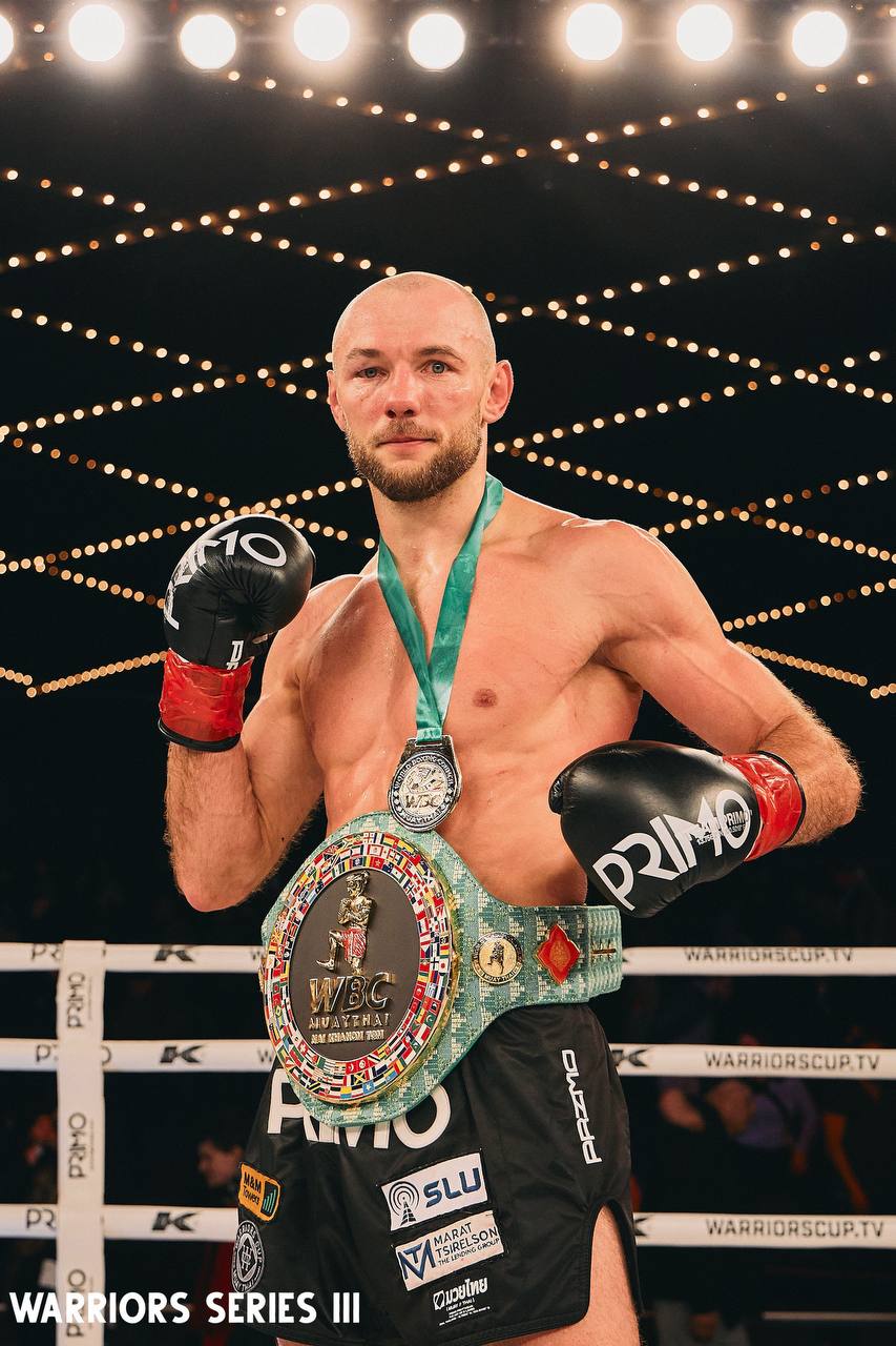 Coach Dzmitry with WBC Muay Thai championship belt